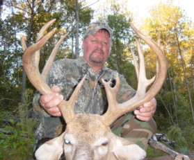 Rusty took this big buck with a bow.